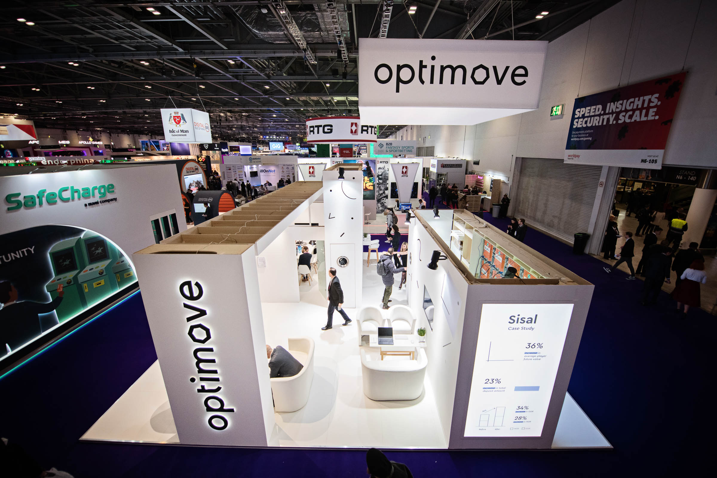A view of Optimove Exhibition stand from above, people interacting, standing around the exhibition stand.