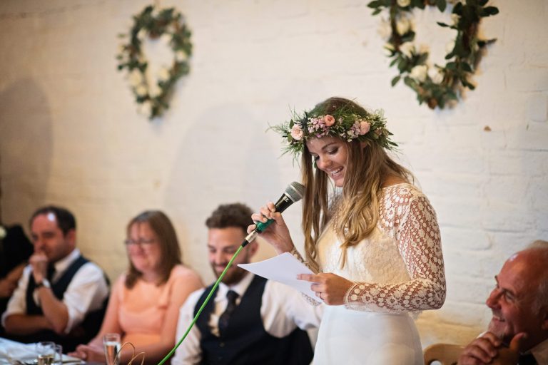 Bride delivers her speech at wedding venue Overbarn, Gloucester.