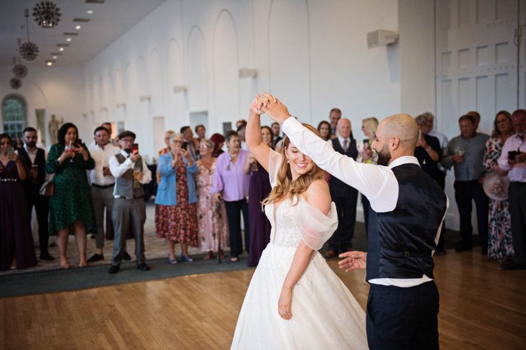 Photo of bride and groom doing their first dance.