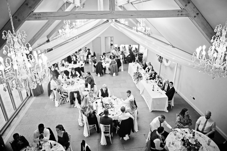 B&w over view image of Blackwell grange wedding set up (all the wedding guests are seated). Candid photo by Blooming Photography. Taken at Blackwell Grange, Warwickshire.