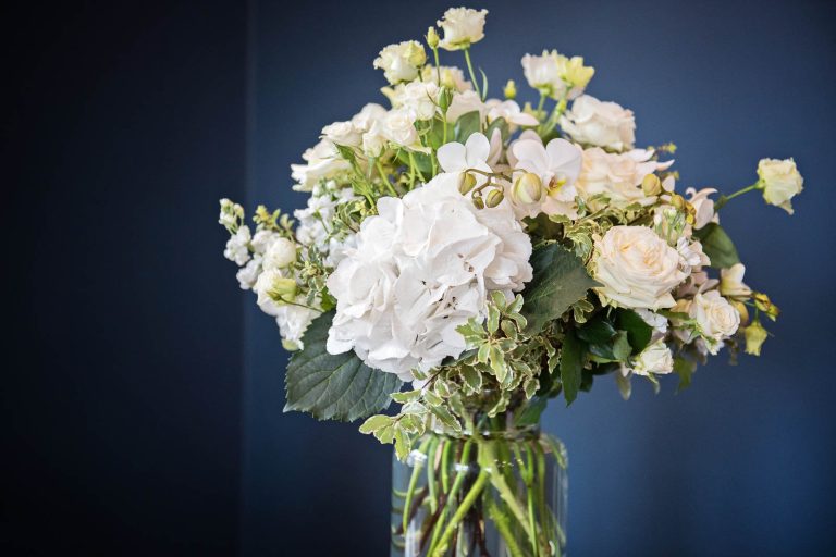 Wedding flowers at Winchester Registry Office Wedding, candid photo by Blooming Photography