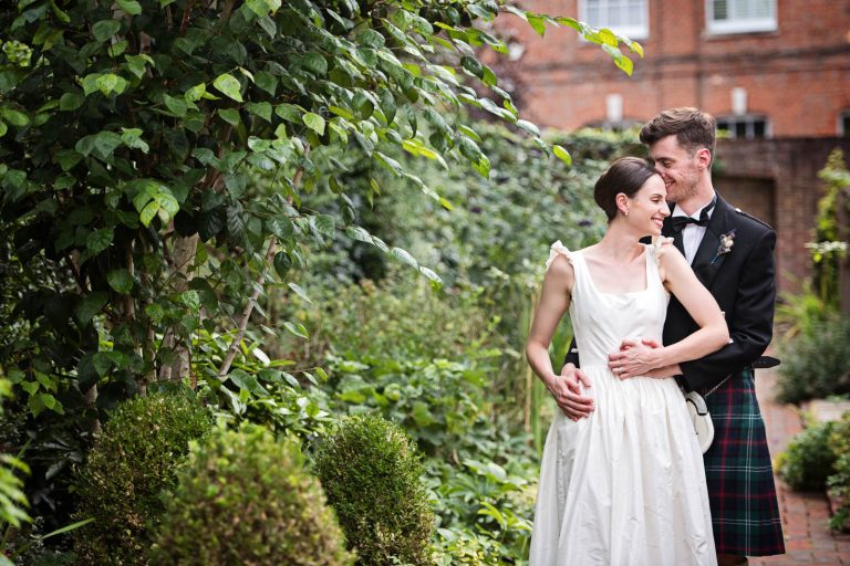 Natural Storytelling portrait of Bride and Groom at a wedding at Hotel du Vin, Winchester. Photo by Blooming Photography.
