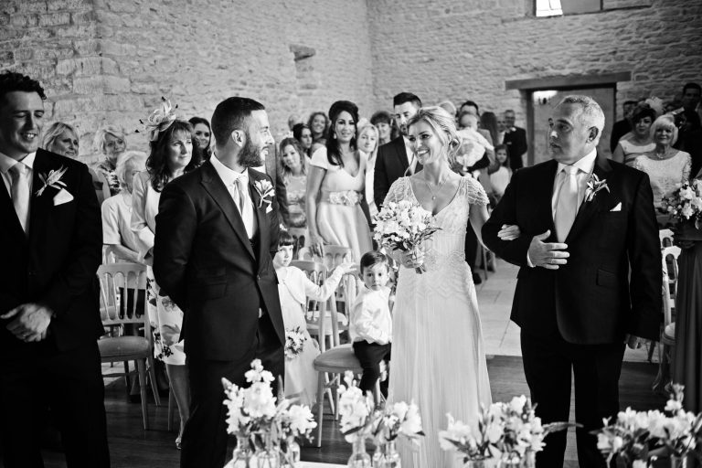 Unposed wedding ceremony at Kingscote Barn