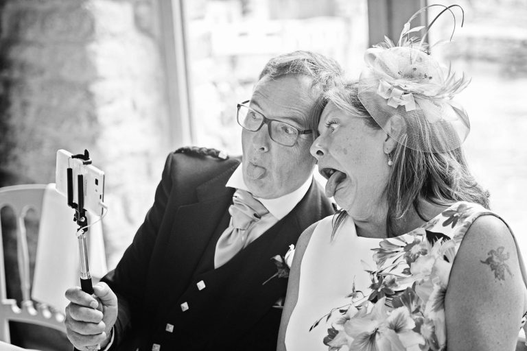 Candid fun wedding photos at Kingscote Barn