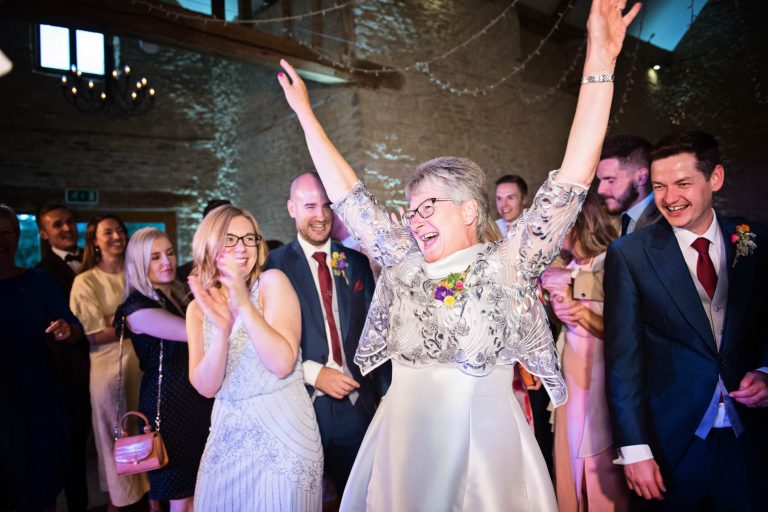 Kingscote Barn mother of groom on dance floor