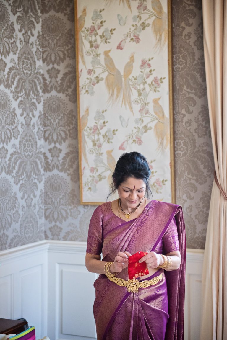 Candid photo of mother of bride at North Mymms Park, by Blooming Photography