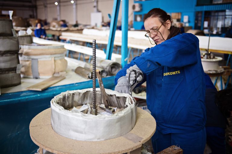 A worker creating an expansion joint in a engineering factory in Romania.