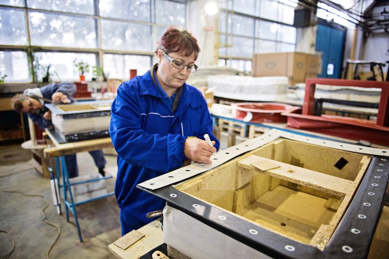 Collogue working to create an expansion joint. Engineering.