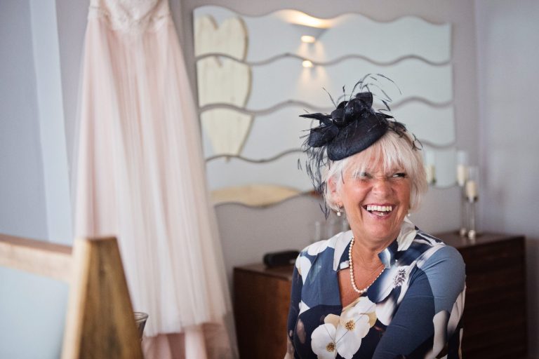 Candid photo of lady smiling.