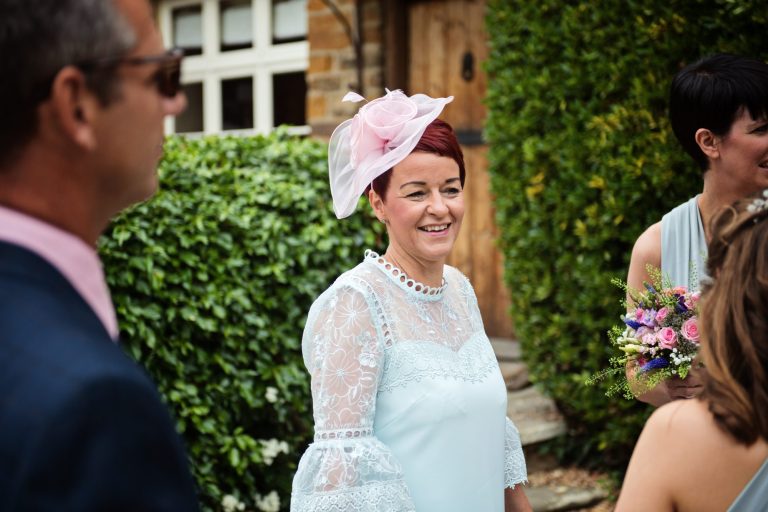 Candid photo of brides mum and guests.