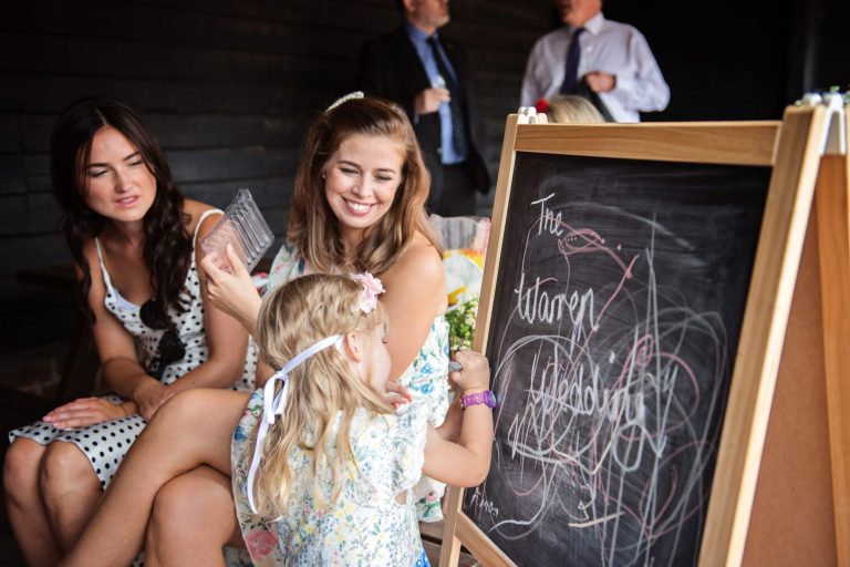 Candid wedding photo at Gloucestershire wedding venue Over Barn, Gloucester.