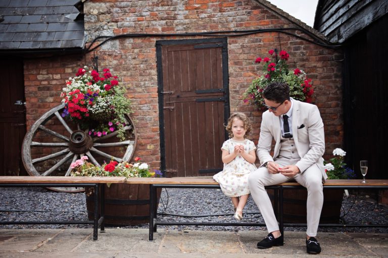 Candid wedding photo at Gloucestershire wedding venue Over Barn, Gloucester.