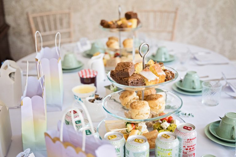 Photo of a cake stand with cakes for afternoon tea at a wedding