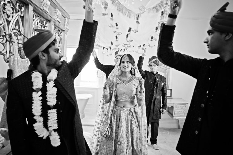 Kanyadaan, wedding ceremony at Manor By The Lake, Cheltenham photography by Blooming Photography