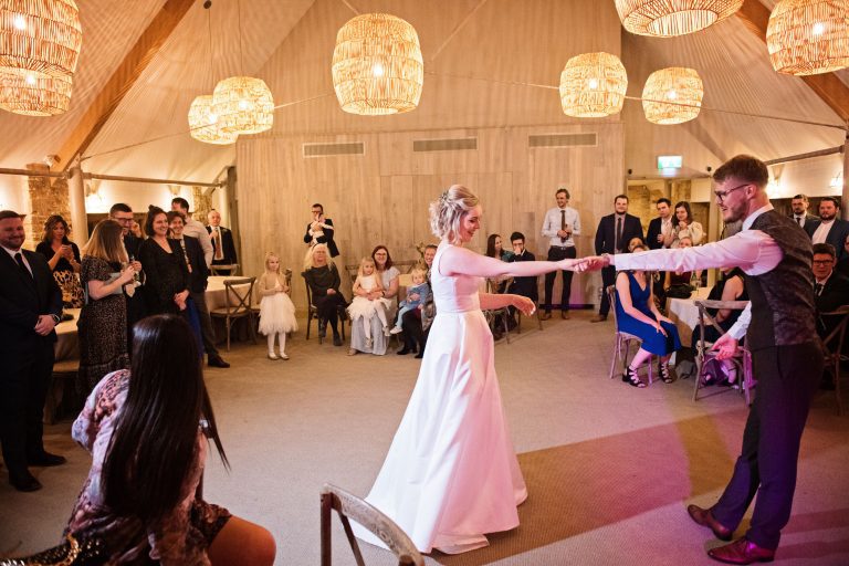 Bride and groom enjoy their first dance at Calcot Manor.