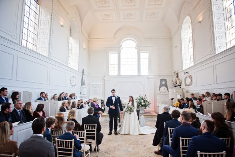 Stunning photograph during a wedding ceremony at the chapel at Compton Verney.