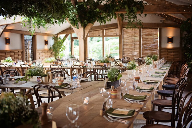 Wedding breakfast set up at Cripps Barn. Rustic yet modern.