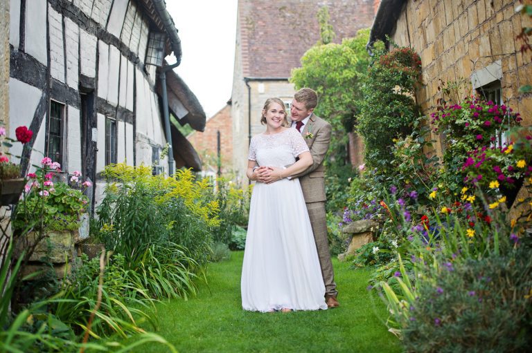 Bride and groom catch a moment together at The Fleece Inn, Bretforton,, Evesham.