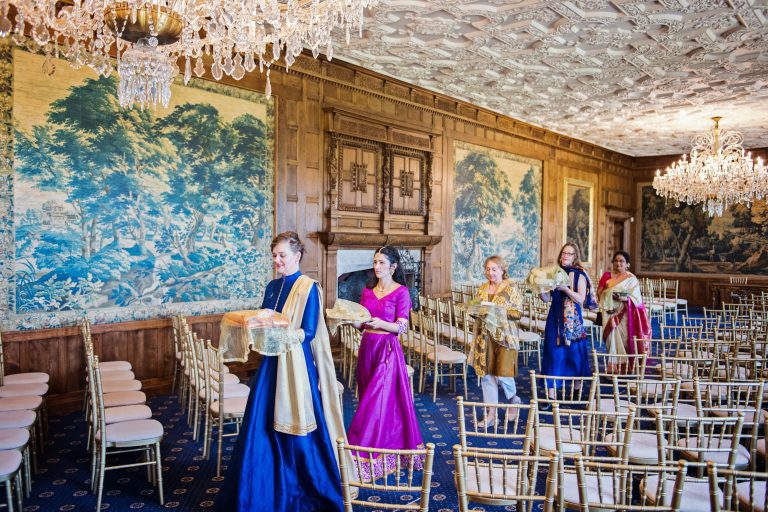 Grooms mother and family carrying gifts for the Hindu ceremony.