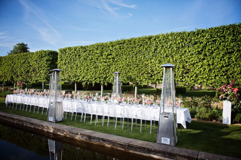 Outdoor wedding breakfast set up at Temple Guiting Manor.