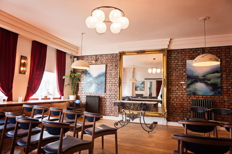 Overview of the wedding ceremony layout with chairs.