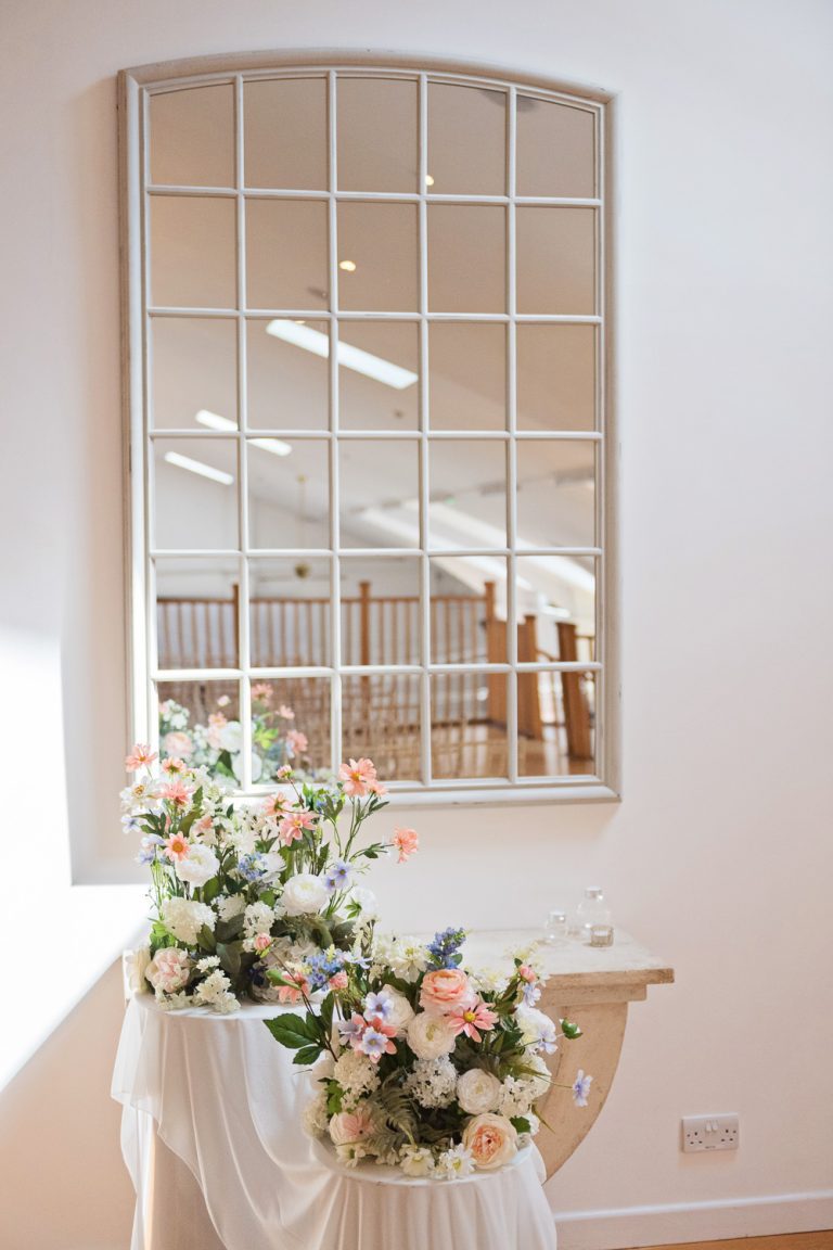 Wedding flowers and mirror.