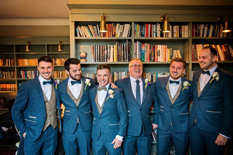 Groomsmen line up before the ceremony.