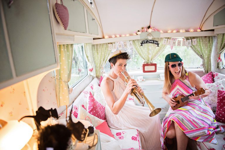 Wedding guests having fun in the photo booth.