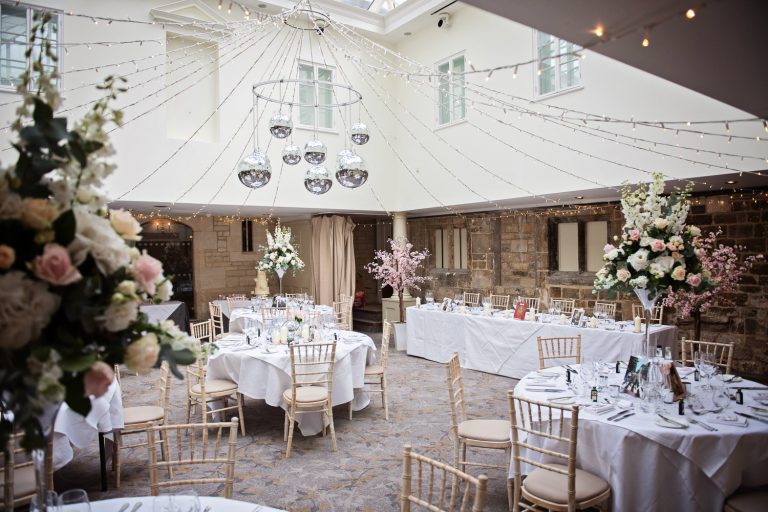 Wedding breakfast suite set up at Ellenborough Park.