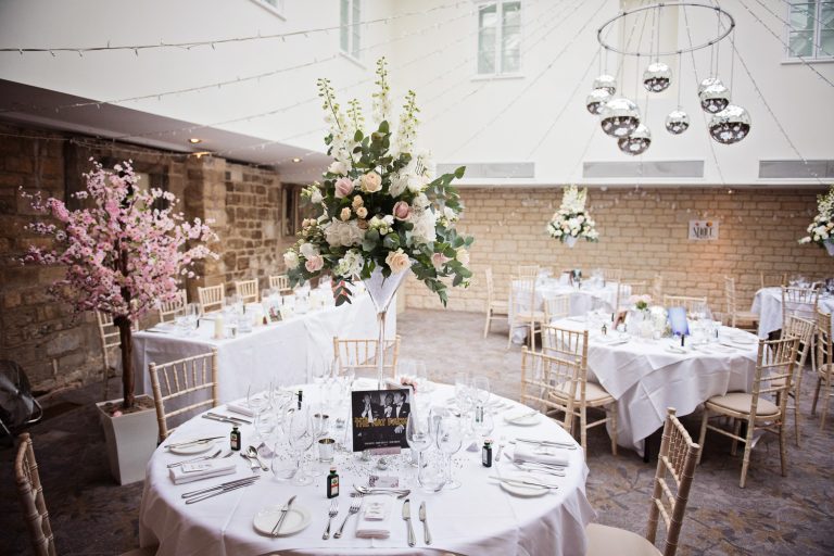 Wedding breakfast suite set up at Ellenborough Park.