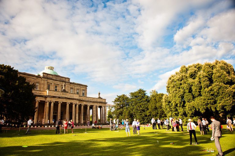 Wedding guests playing games in the grounds of Pittville Pump Rooms.