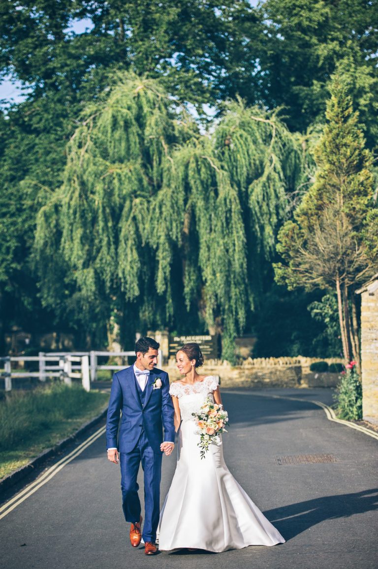 Bride and groom spending time together at The Slaughters Country Inn in Lower Slaughter.