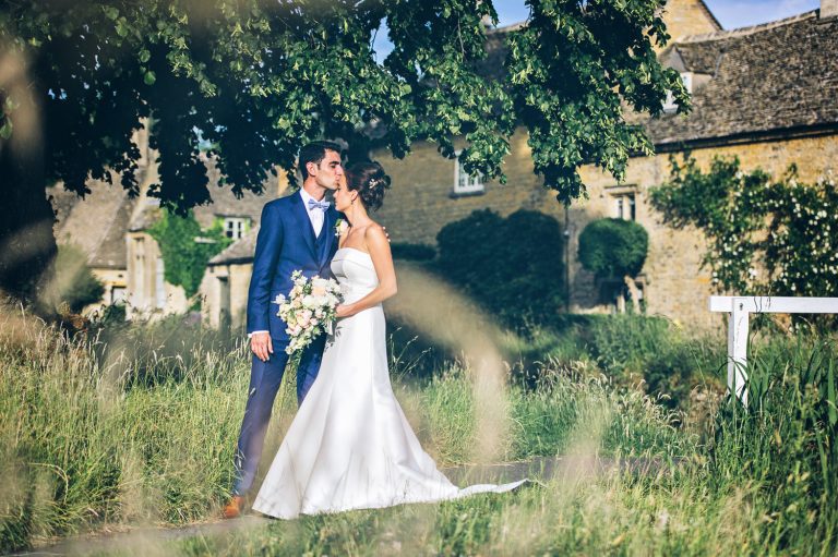 Bride and groom relax in The Slaughters.