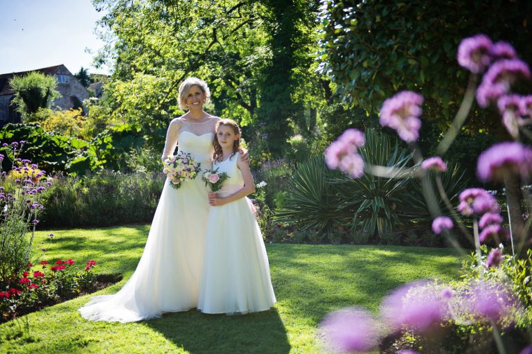 Flowergirl and bride in the gardens.