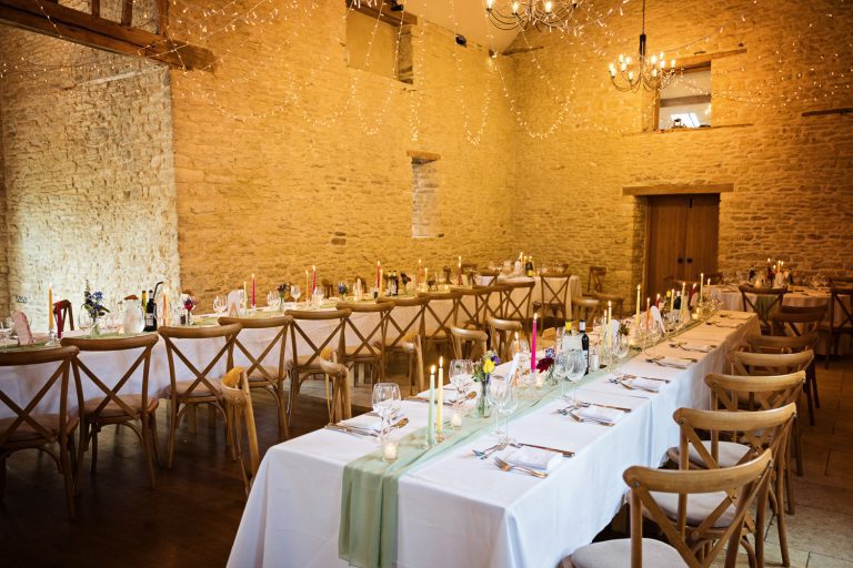 Wedding breakfast long table set up at Kingscote Barn.