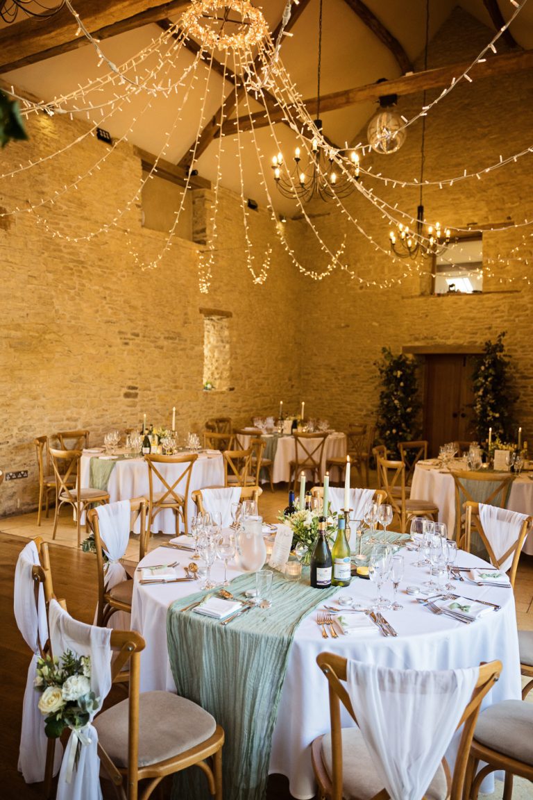 Wedding breakfast in a Cotswold Wedding Barn.
