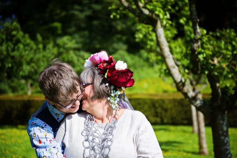 Bride and groom grab a moment together at the Rococo Gardens, Painswick.
