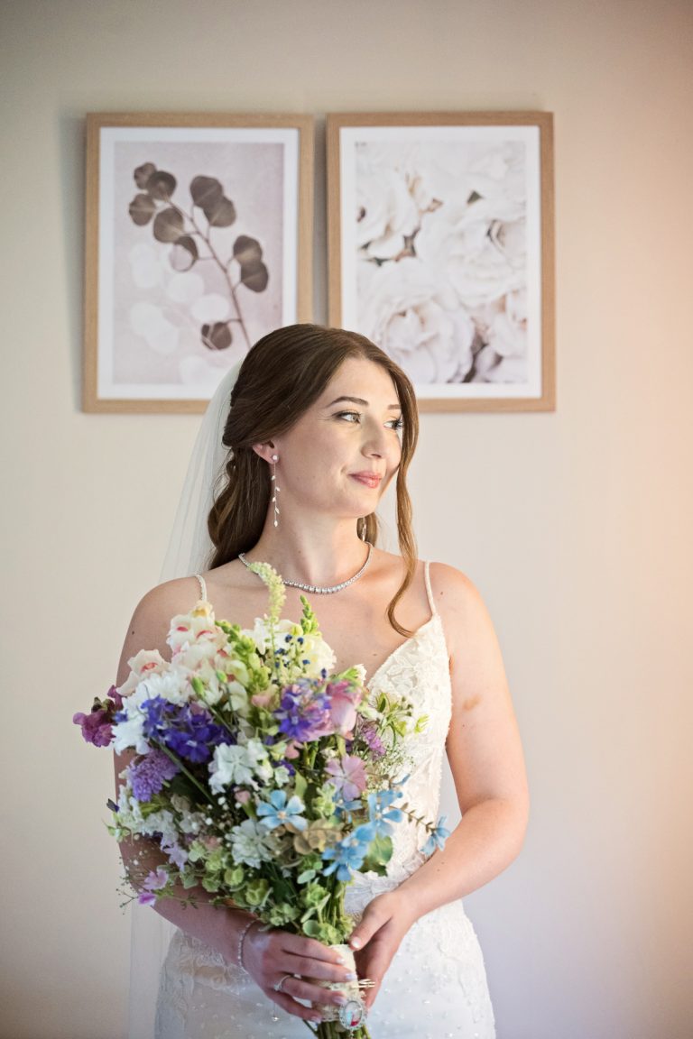 Bride holding her wedding flowers.