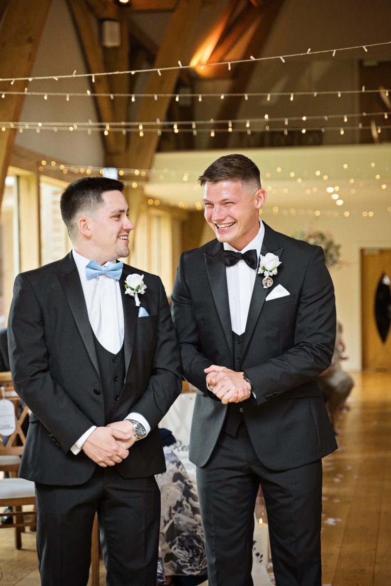 Anxious groom, stands with his best man